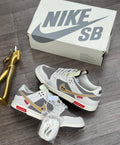 Nike SB Dunk Low – PandaPrank Grey/Gold